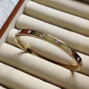 Kate Spade 14K Gold Plated Crystal Hinge Bangle